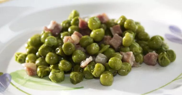 Peas with Ham: A Spanish Classic with Green Peas and Savory Ham